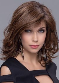 Change | This shoulder length wig is incredibly flattering with all over layers and a slight flip
