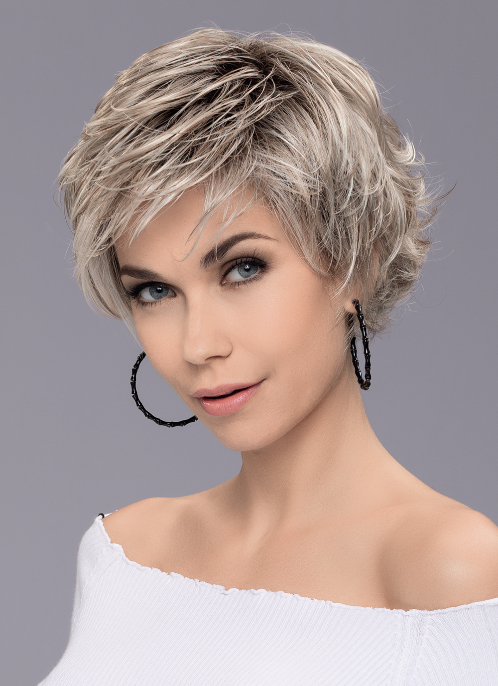 The Raise is a short trendy style with a fringe that sweeps to the side opening up your face