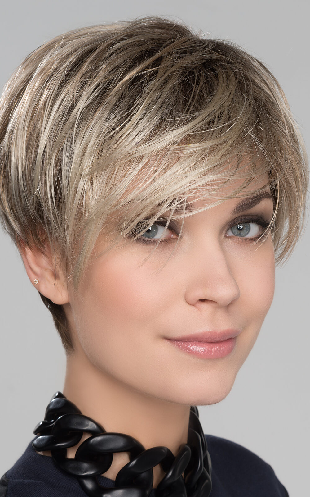 Amazing beautiful asymmetric wig which has the wow factor with its sweeping side fringe and choppy layers