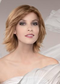 The Sole by Ellen Wille is a shoulder-length with feathered locks style made of 100% European Remy Human Hair