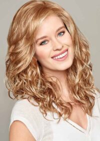 The Harper has pre-styled curly waves for a soft and feminine look