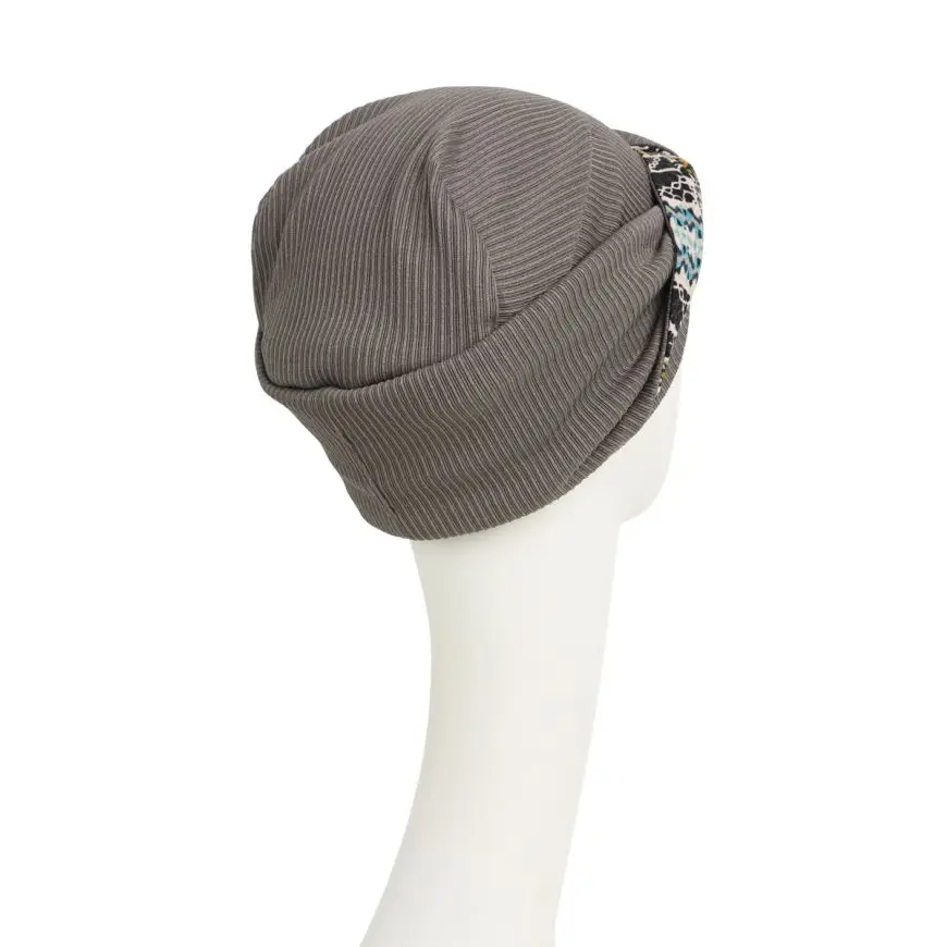 HocEmmy Turban | Sage Illusions | 1555-089555-0895HocEmmy Turban | Sage Illusions | 1555-0895ter side, a smart and sporty fabric in a kaleidoscope blend of turquoise, black and yellow colours. HocEmmy Turban | Sage Illusions | 1555-0895